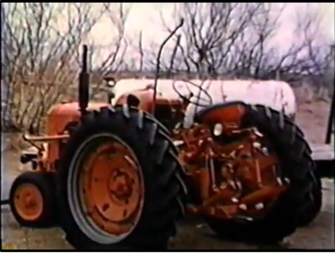Old tractor and fuel tank