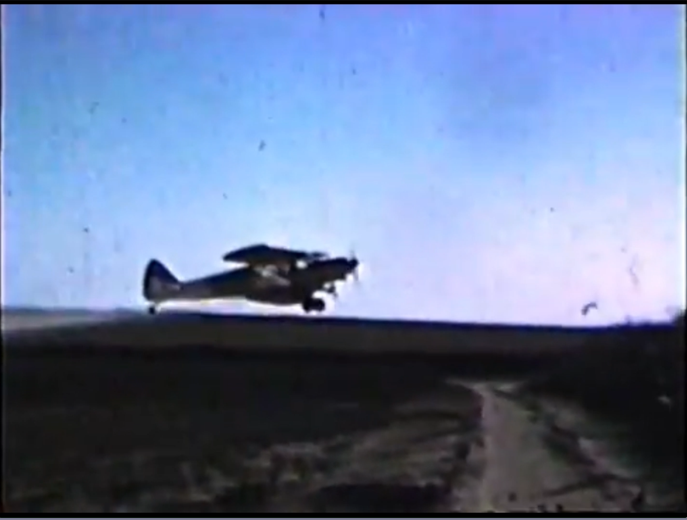 Crop spraying airplane