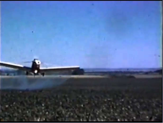 Crop spraying airplane